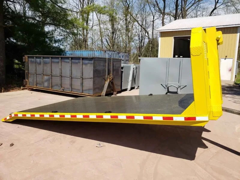 Side view of a Yellow flatbed